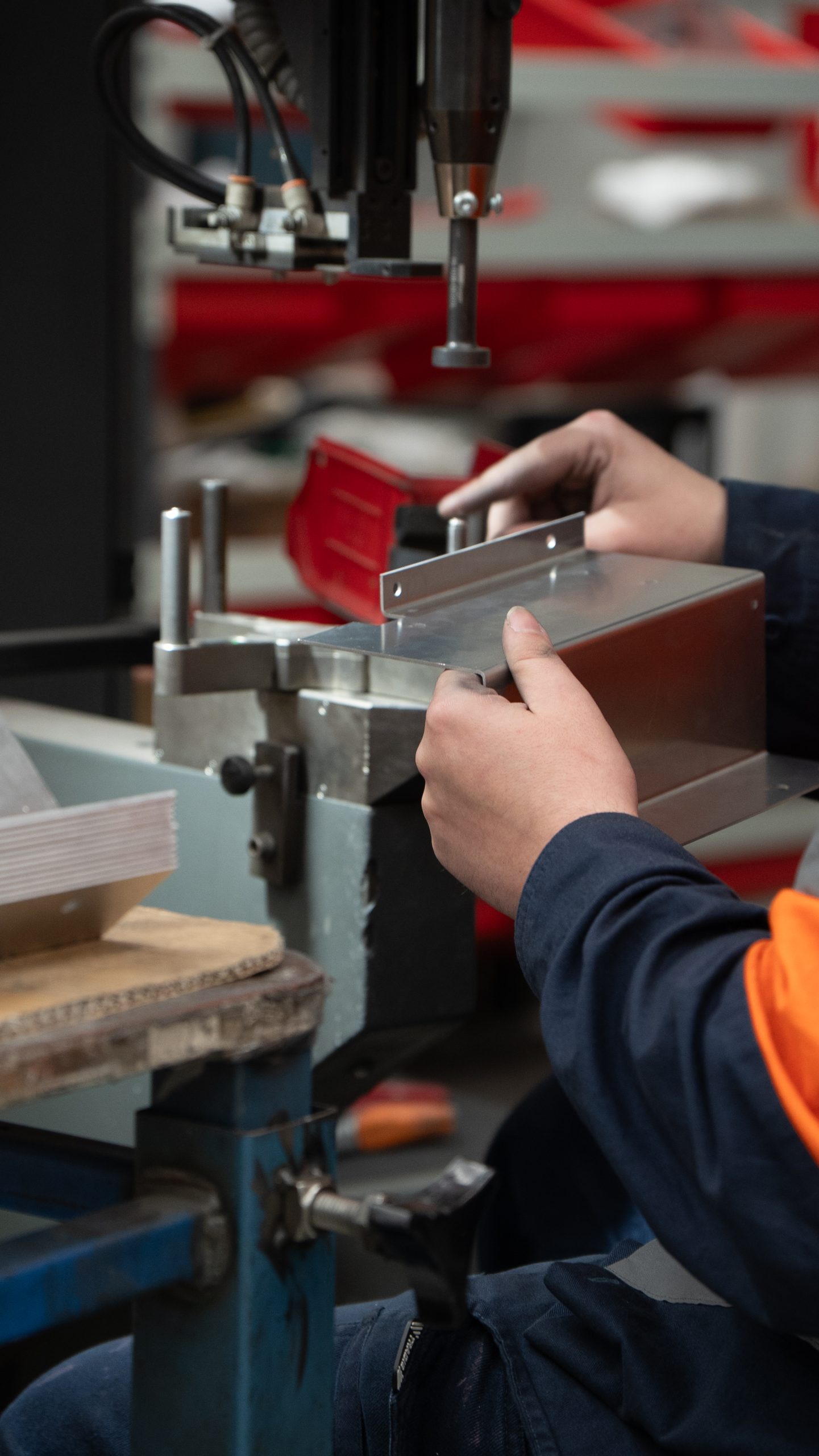 Amapro technician forming a sheet-metal component