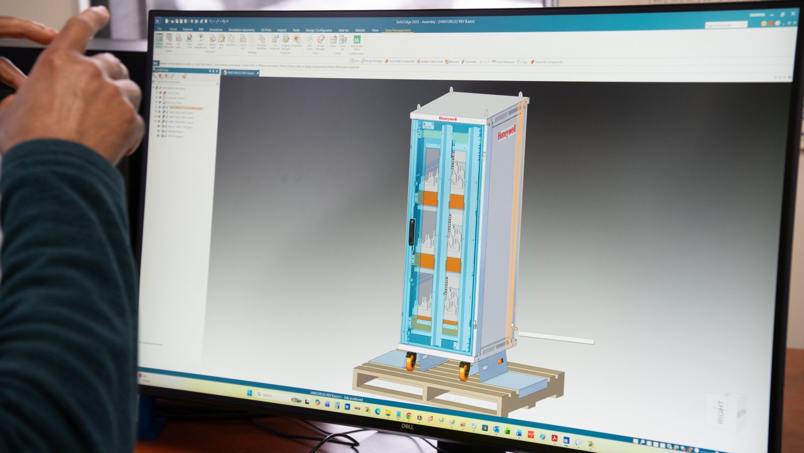 CAD model of a sheet metal enclosure on screen