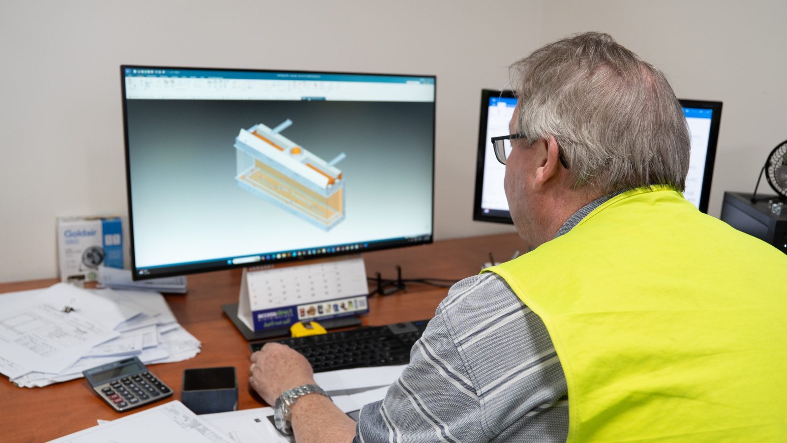 Amapro designer working on a sheet metal CAD model