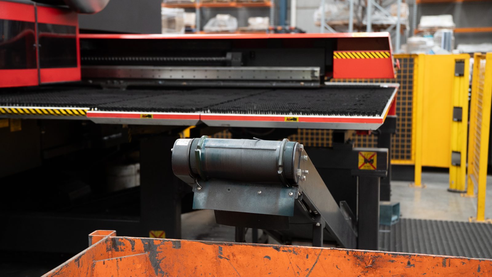 Turret punch bed forming holes in a steel sheet
